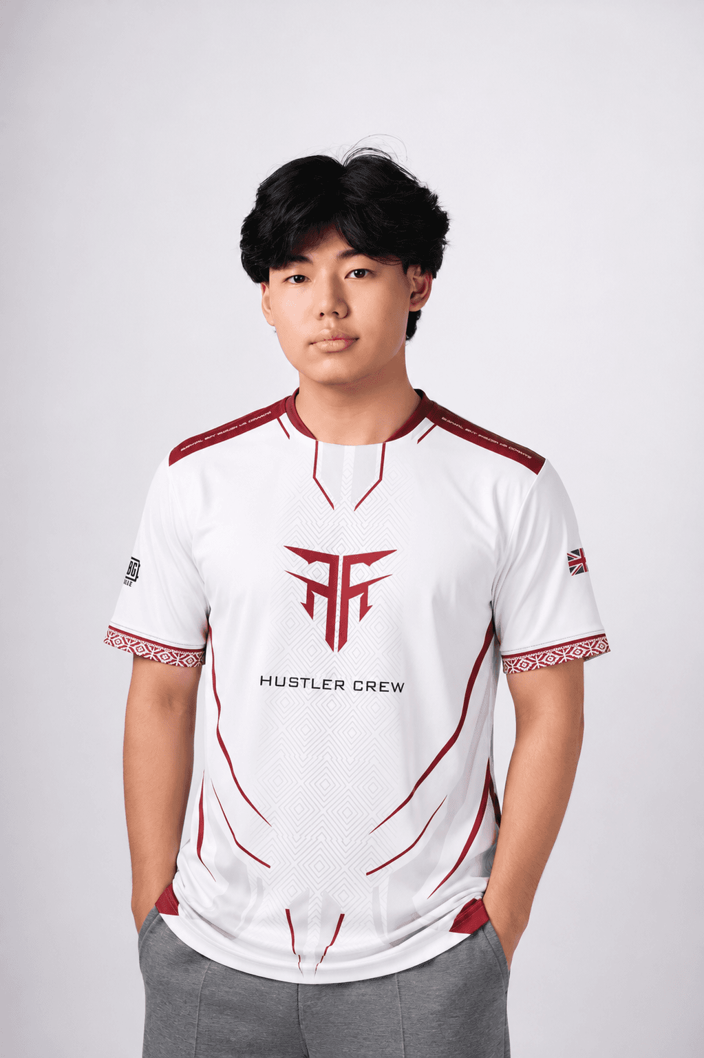 Hustler Crew Jersey 01 — white kit with maroon shoulder panels and crest, front view